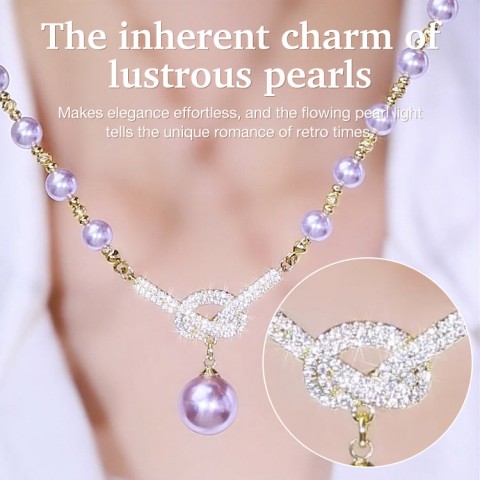 Diamond bow necklace