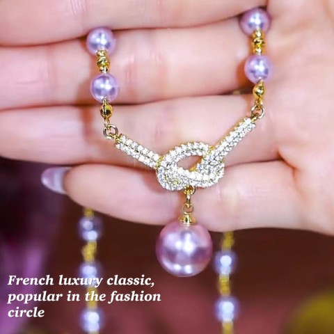 Diamond bow necklace